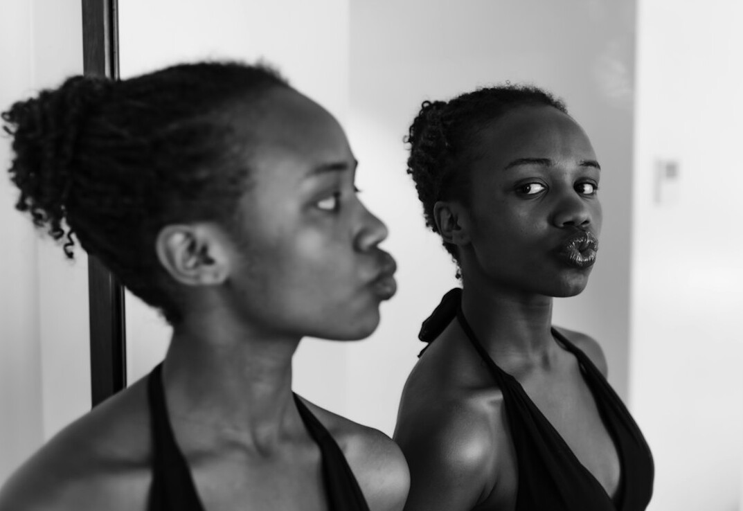 person practicing speech in mirror